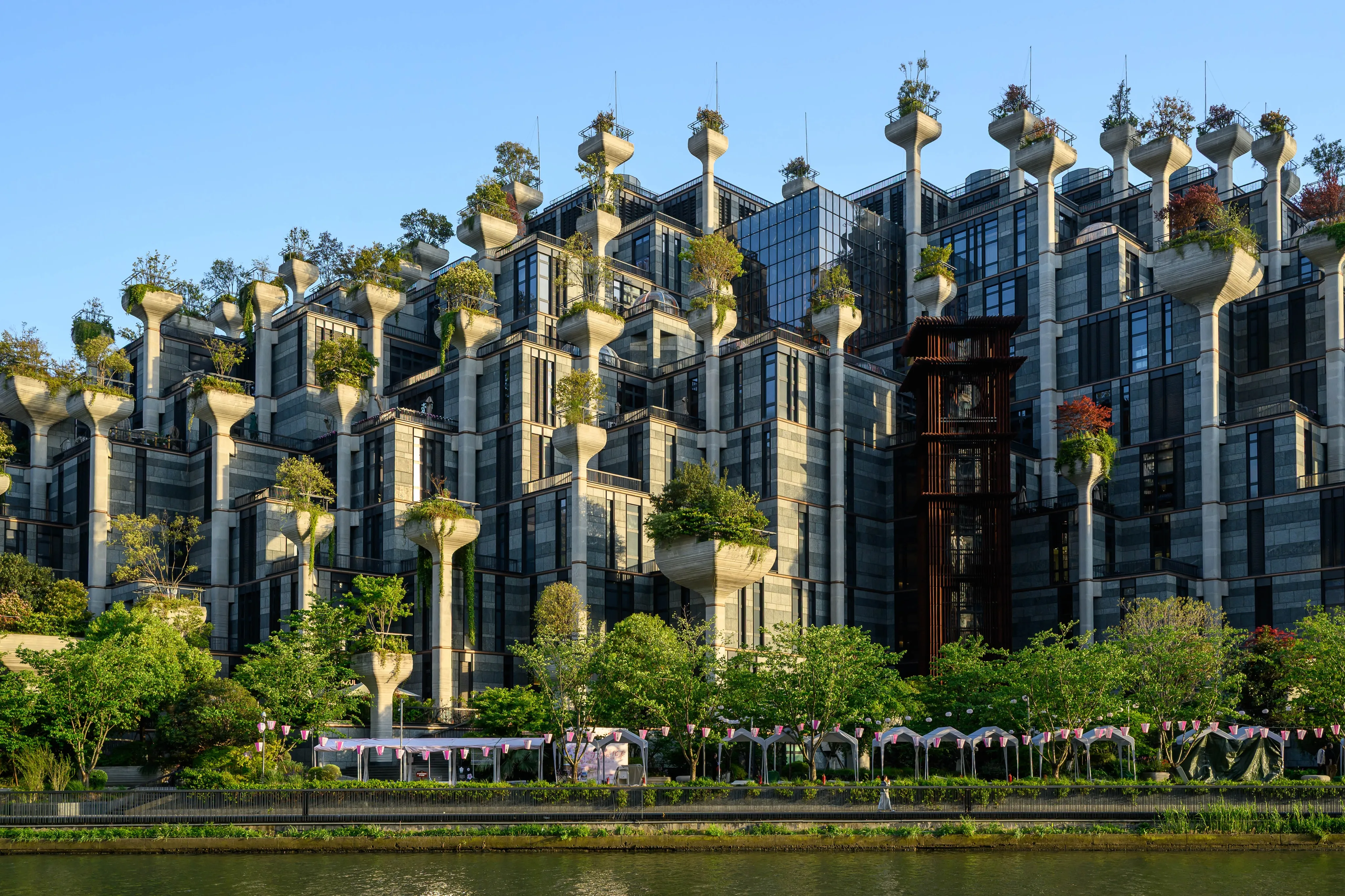 A building facade covered in vertical gardens and greenery