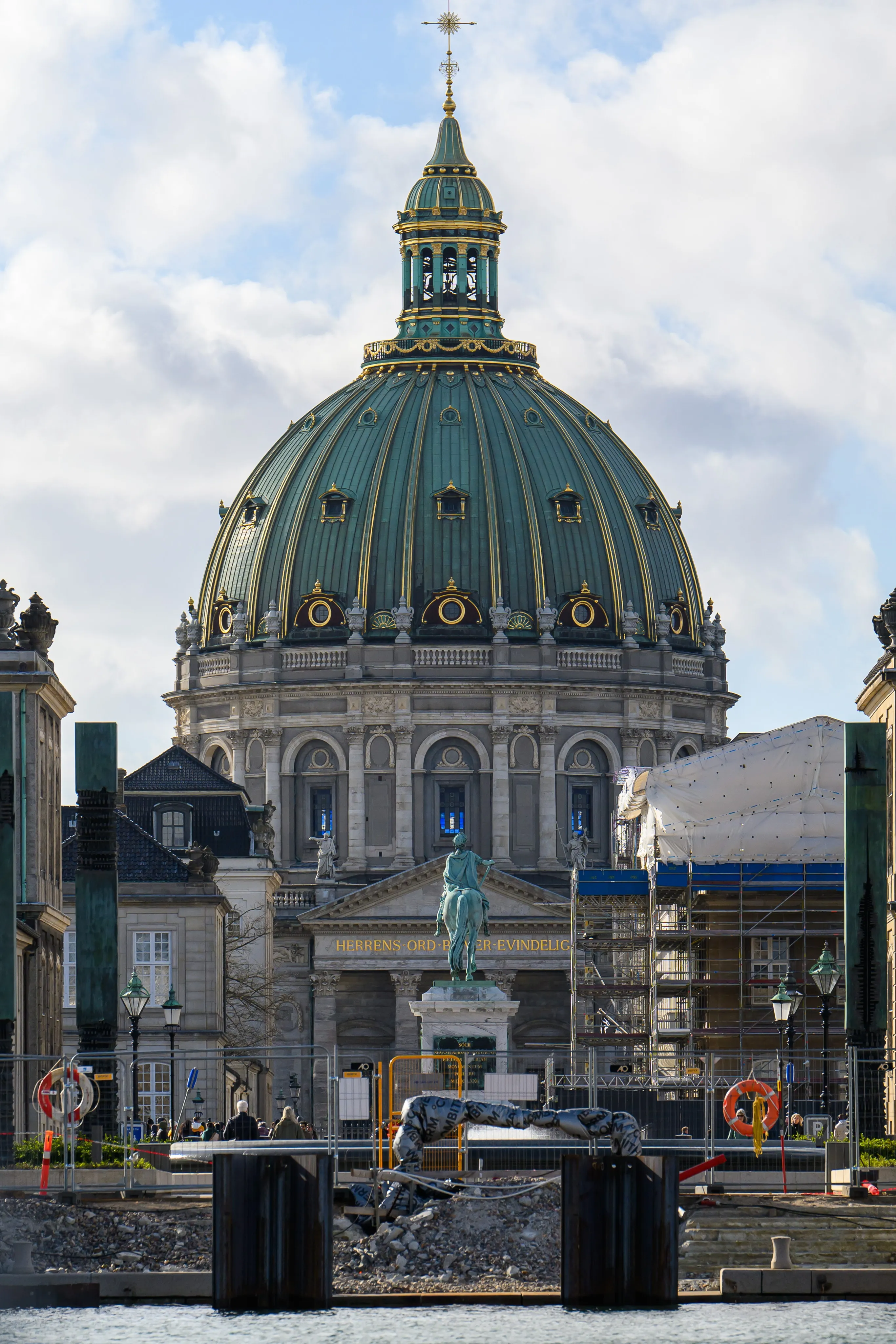 A domed church framed by a city street